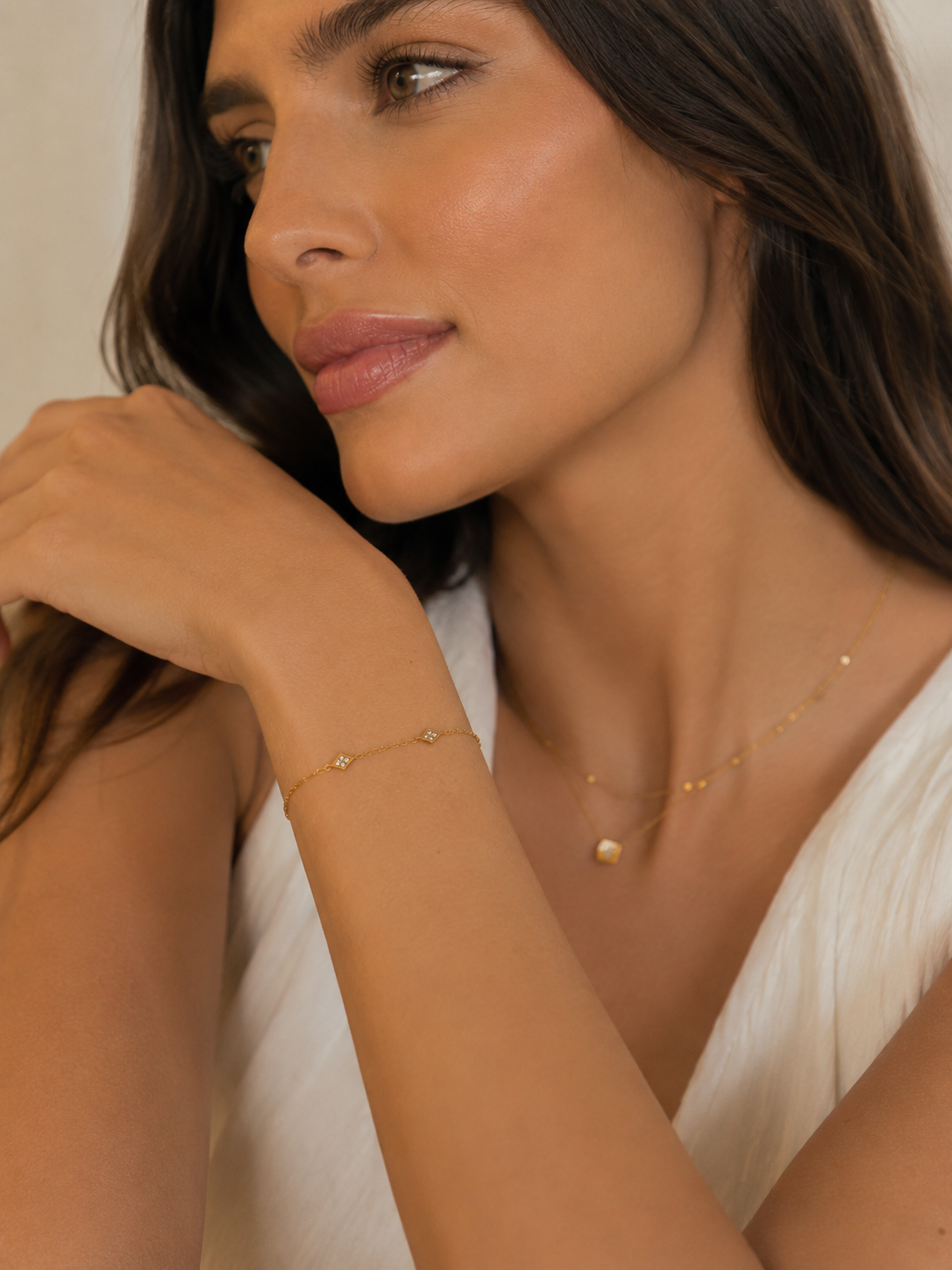 Pulseira Mini Losangos Cravejados em Aço Banhado a Ouro