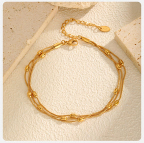 Pulseira 3 Fios com Bolinhas Banhada a Ouro 18k