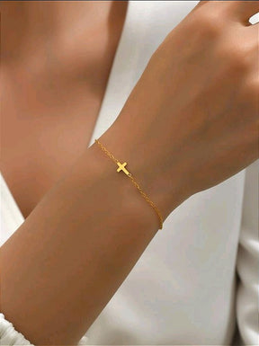 Pulseira Mini Cruz Banhada a Ouro 18k