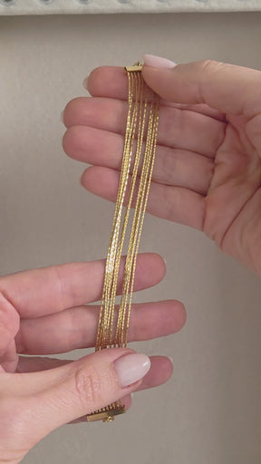 Pulseira Multifios em Aço Banhado a Ouro